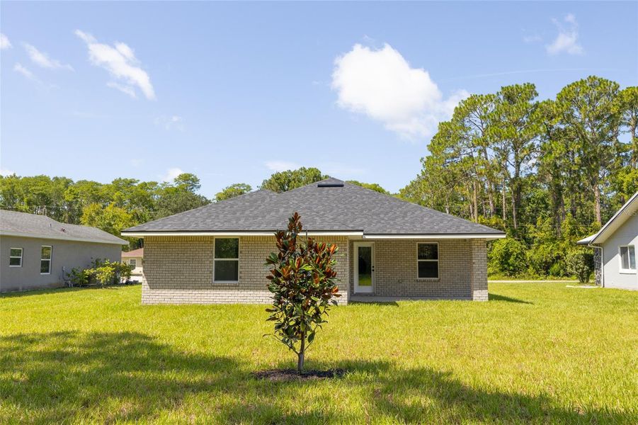 Exterior details and patio area of a home in Palm Coast, Palm Coast (Image 17).