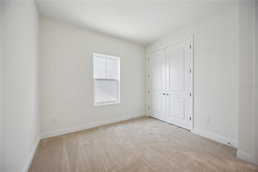 Spacious, unfurnished interior of a new home in Bungalow Walk at Lakewood Ranch, Lakewood Ranch (Image 12).