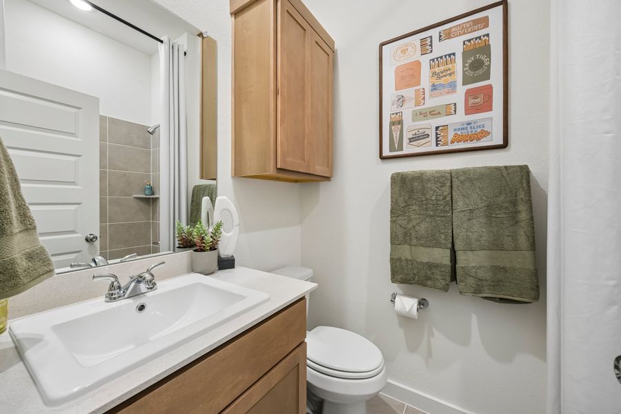 Bathroom in the Pecos home plan by Trophy Signature Homes – REPRESENTATIVE PHOTO