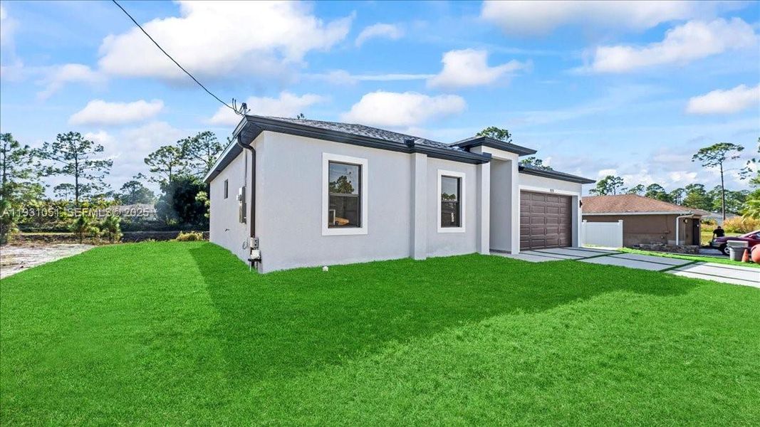 Exterior details and patio area of a home in , Lehigh Acres (Image 3). Exterior details and patio area of a home in , Lehigh Acres (Image 3).
