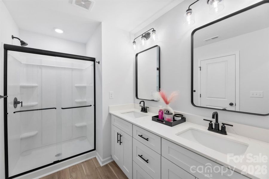 Furnished interior view inside a new home in Surrey Woods, Charlotte (Image 23).