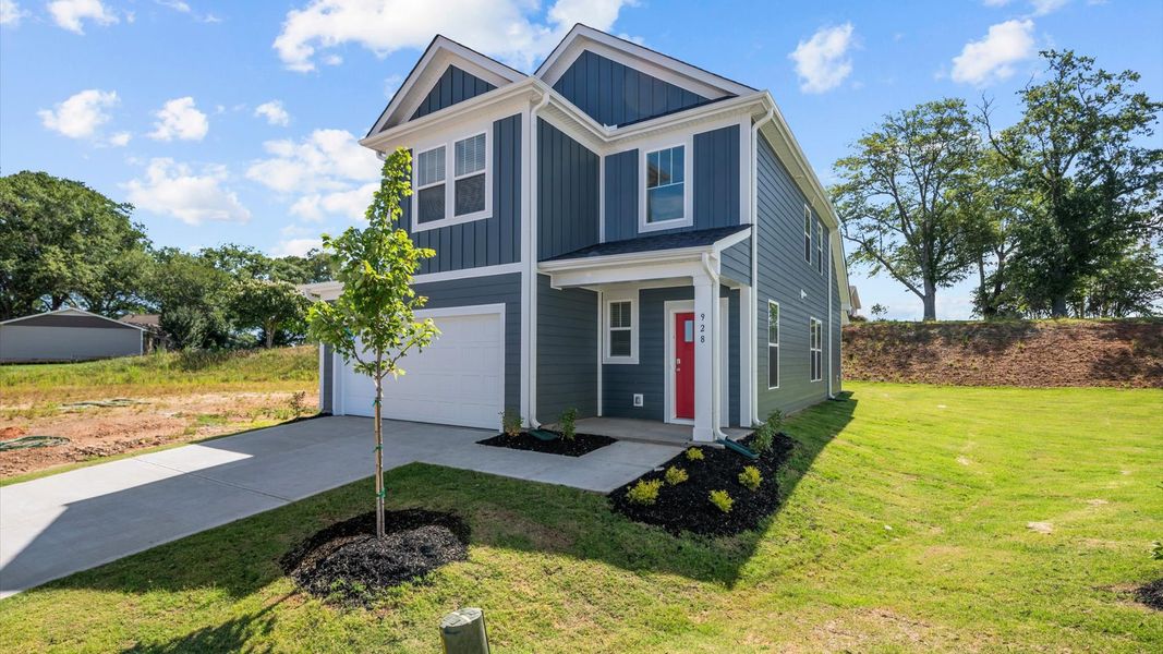 Representative exterior photo of a completed home built from the Freesia by DRB Homes in Spring Branch, Smyrna, TN (Image 26).
