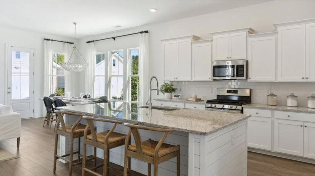 Furnished interior view inside a new home in Carnes Crossroads: Row Collection, Summerville (Image 9). Furnished interior view inside a new home in Carnes Crossroads: Row Collection, Summerville (Image 9).