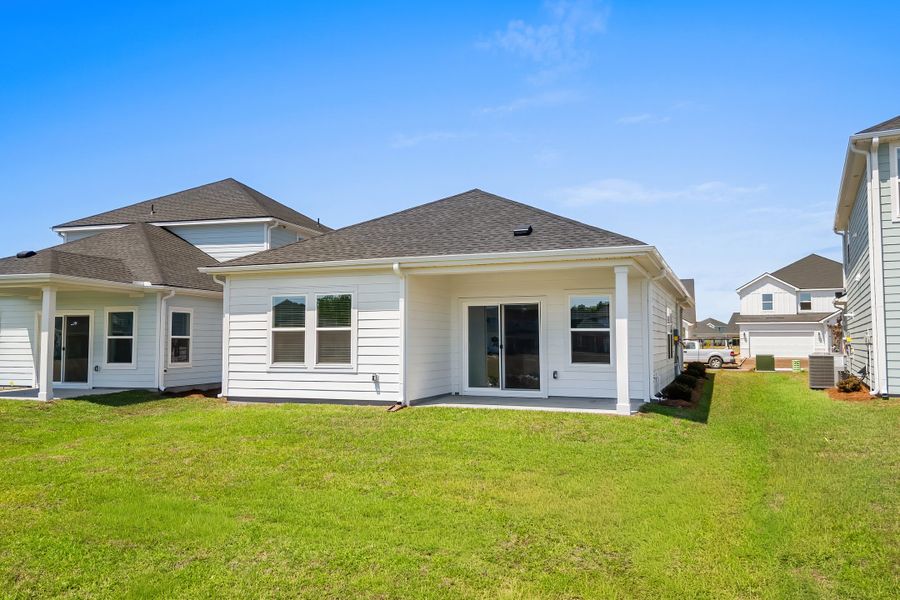 Exterior details and patio area of a home in Waterside - Boardwalk Series, Longs (Image 3).