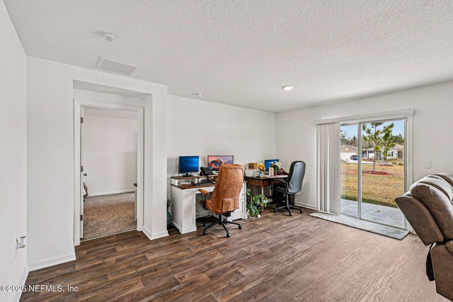 Furnished interior view inside a new home in Cross Creek Express, Green Cove Springs (Image 30).