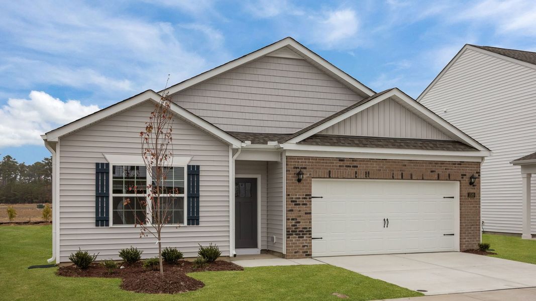 Front exterior of a new home in Ridgewood Farms, Winterville, NC, highlighting curb appeal (Image 18).