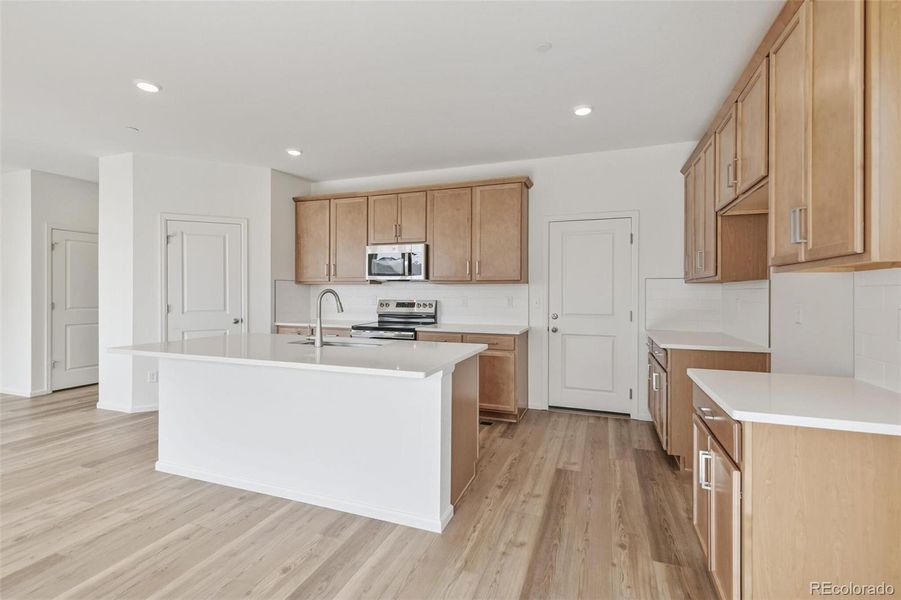 Furnished interior view inside a new home in Turnberry, Commerce City (Image 5).