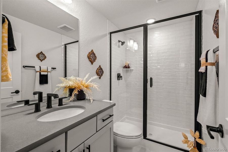 Furnished interior view inside a new home in Wolf Ranch - Enclave Collection, Colorado Springs (Image 3).