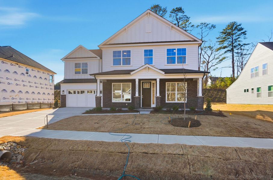 Front exterior of a new home in Rone Creek, Waxhaw, NC, highlighting curb appeal (Image 28).
