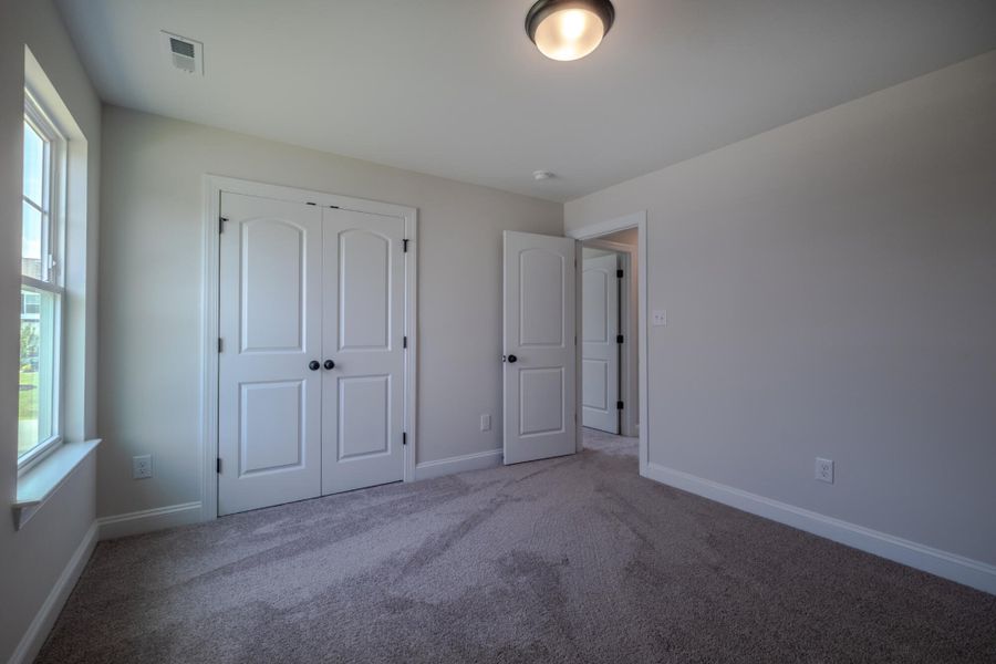Spacious, unfurnished interior of a new home in Cottages at Piper Village, Trinity (Image 39). Spacious, unfurnished interior of a new home in Cottages at Piper Village, Trinity (Image 39).