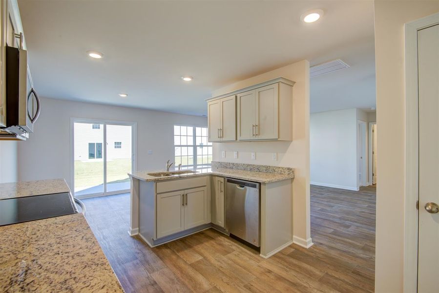 Representative furnished interior of a home built from the CHELSEA by D.R. Horton in Raven Ridge, Lexington (Image 5).