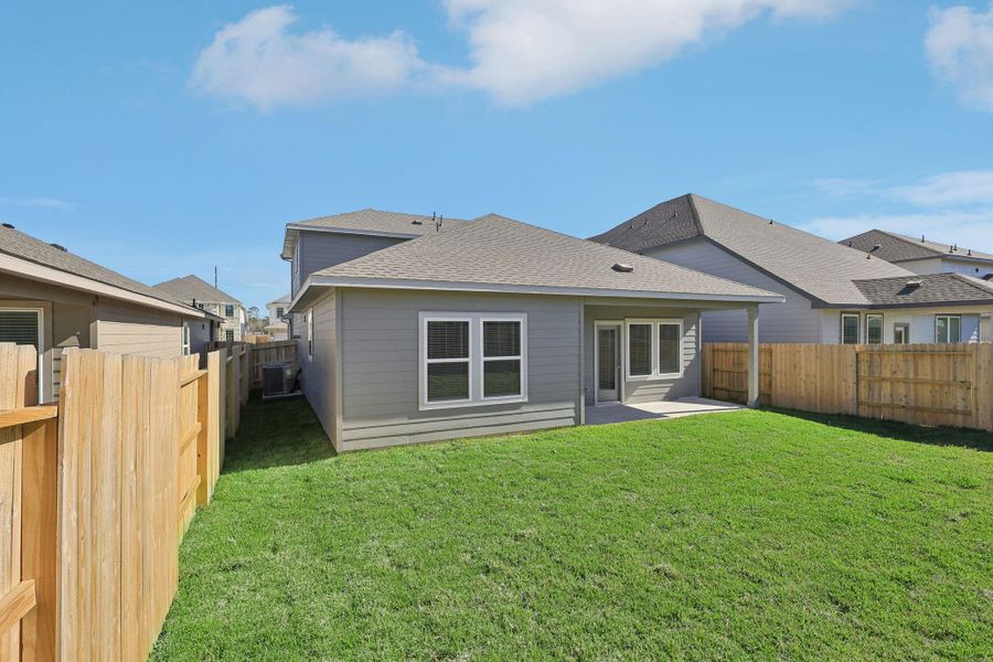 Exterior details and patio area of a home in Landing Meadows - Premier Series, New Caney (Image 24).