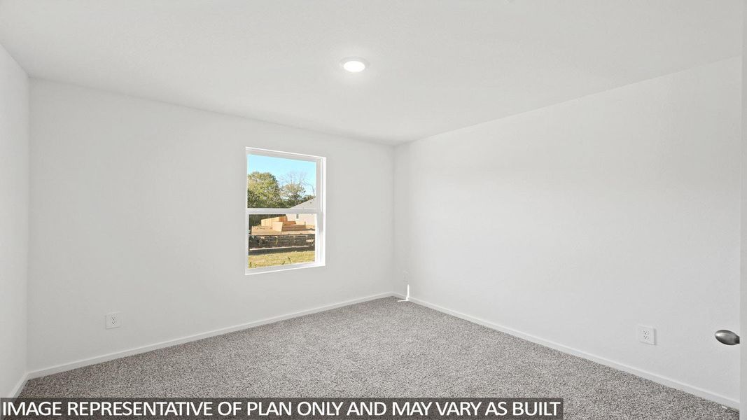 Empty room with carpet floors and baseboards
