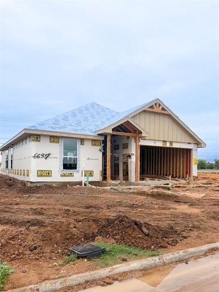 New construction framing with exterior sheathing and roof underlayment