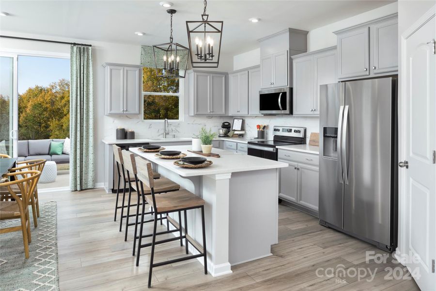 Representative Photo Kitchen features large island perfect for entertaining