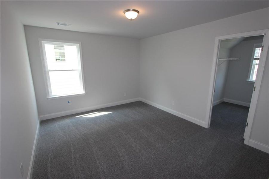 Spacious, unfurnished interior of a new home in Clark Farms, Flowery Branch (Image 22).