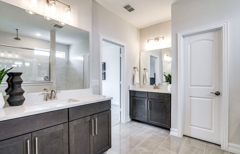 Owner's private bath with dual vanities