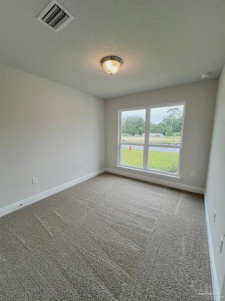 Spacious, unfurnished interior of a new home in Pine Top, Cantonment (Image 8).