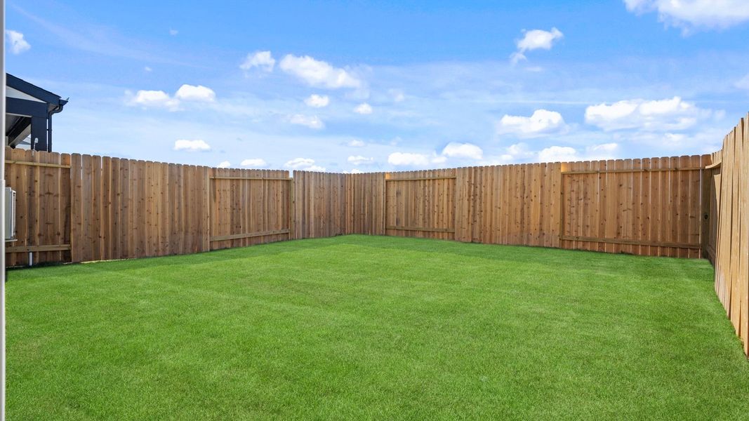Exterior details and patio area of a home in Villarosa at Tamarron, Katy (Image 36).