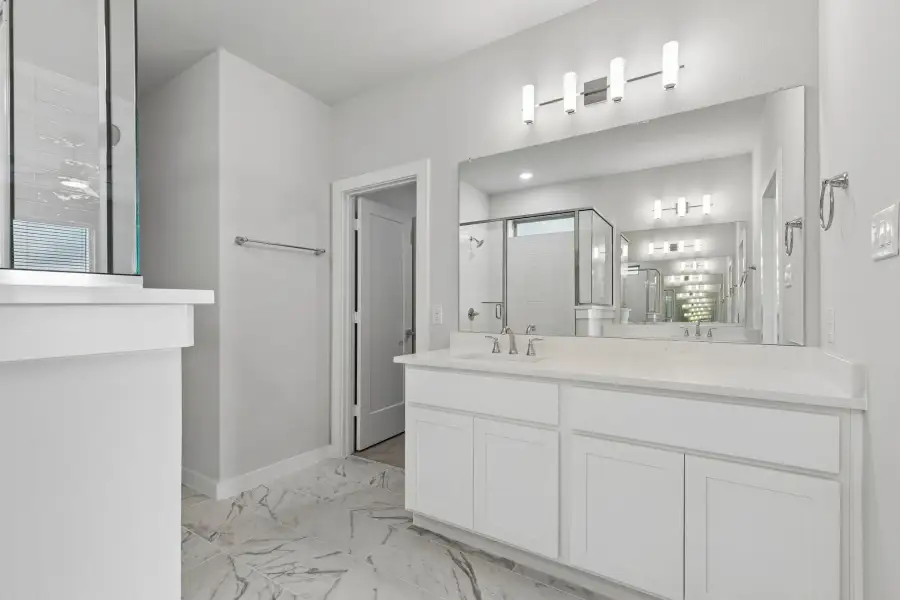 Primary Bathroom in the Winters home plan by Trophy Signature Homes – REPRESENTATIVE PHOTO
