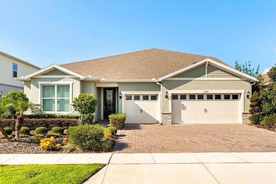 Front exterior of a new home in , Winter Garden, FL, highlighting curb appeal (Image 22).