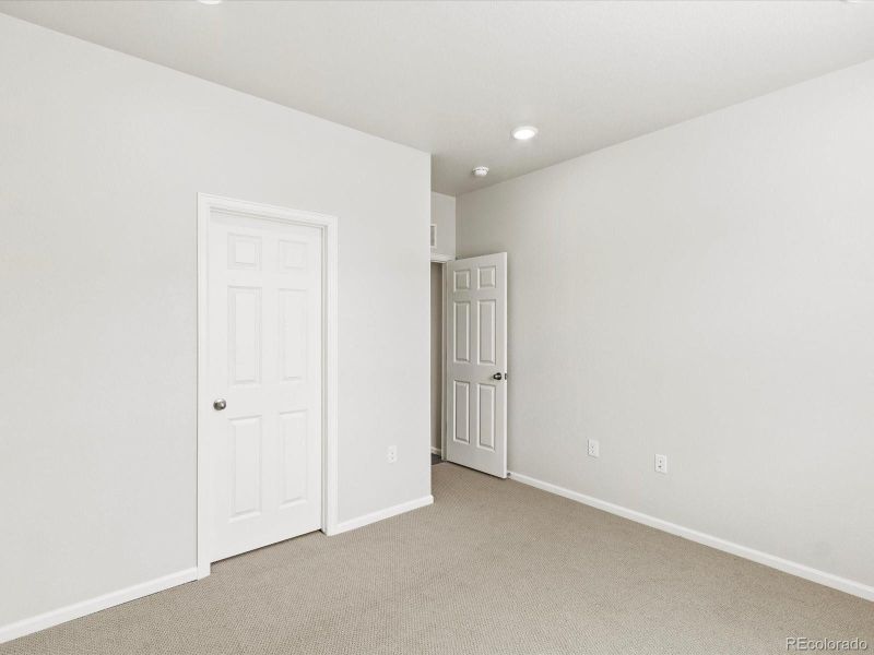 Spacious, unfurnished interior of a new home in Poudre Heights: The Alpine Collection, Windsor (Image 27).