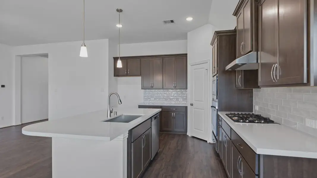 Furnished interior view inside a new home in Sunterra, Katy (Image 16).