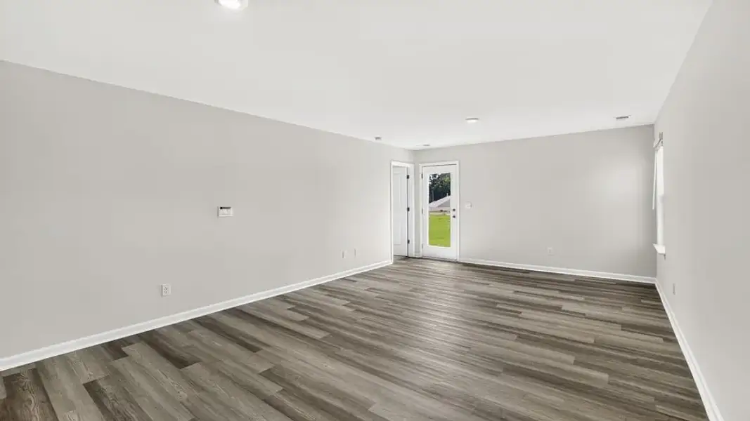 Spacious, unfurnished interior of a new home in Village Grove, Greenville (Image 24).