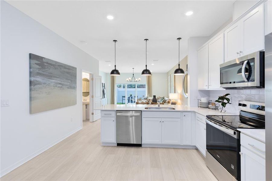 Furnished interior view inside a new home in Harbor Square, Palm Bay (Image 13).