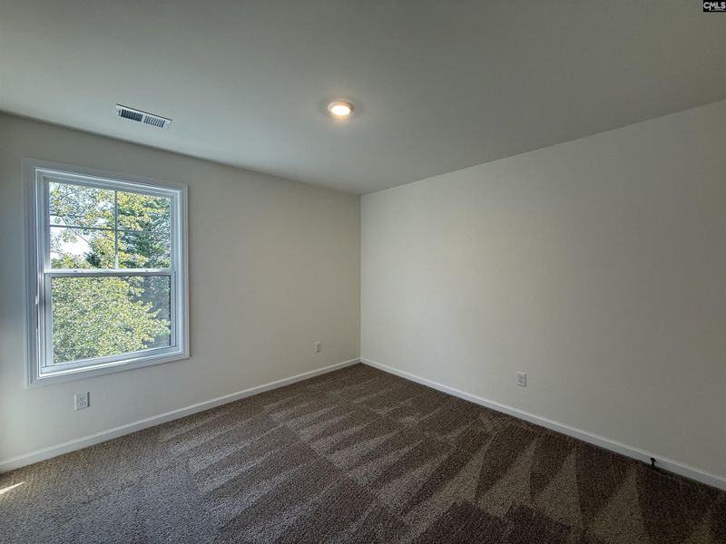 Spacious, unfurnished interior of a new home in Dunbar Village, Cayce (Image 32).