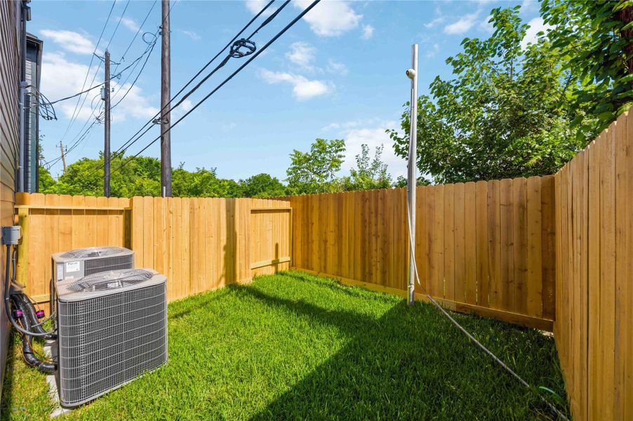 Exterior details and patio area of a home in , Houston (Image 3).