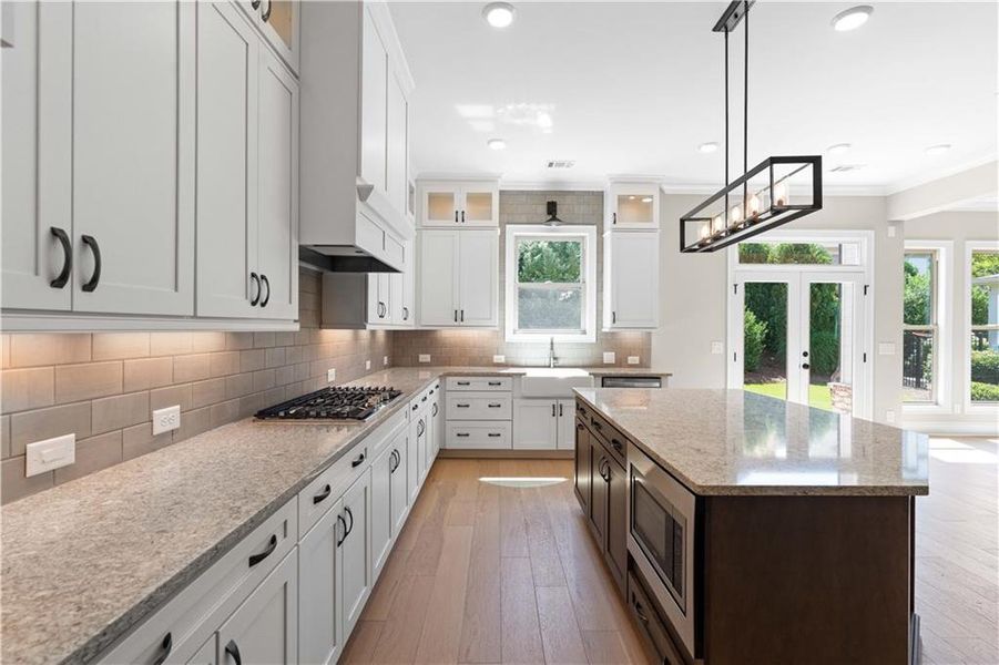 Furnished interior view inside a new home in Bellwyn, Johns Creek (Image 6).