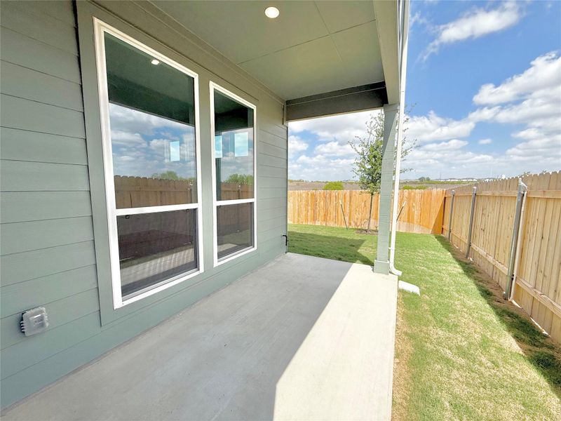 Exterior details and patio area of a home in Porter Country, Buda (Image 2). Exterior details and patio area of a home in Porter Country, Buda (Image 2).