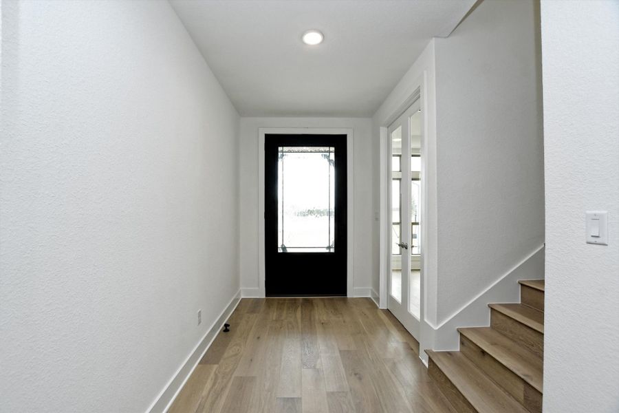 Representative unfurnished interior of a home built from the Madera II by Giddens Homes in Scofield Farms Estates, Georgetown (Image 434).