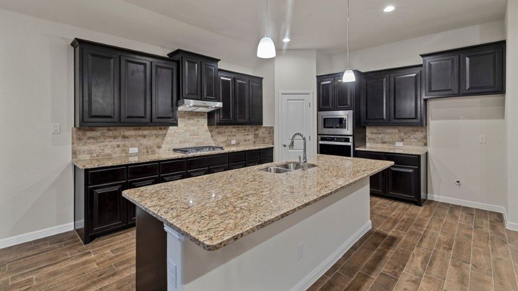 Representative furnished interior of a home built from the Brock by D.R. Horton in Lakeview Pointe, Grand Prairie (Image 9).