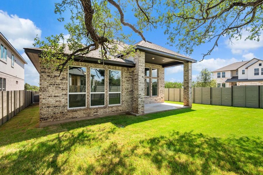 Exterior details and patio area of a home in Wolf Ranch, Georgetown (Image 26).