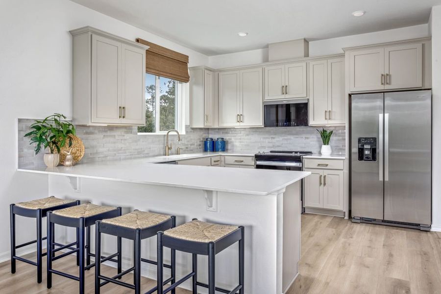 Representative furnished interior of a home built from the 2385 Modeled by KB Home in The Sanctuary I, Clermont (Image 6).