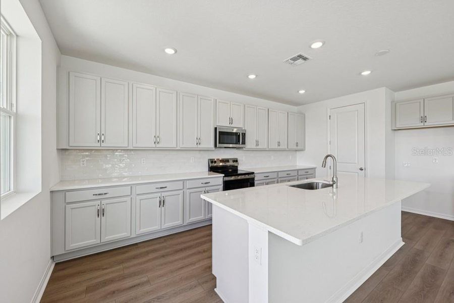 Furnished interior view inside a new home in Trailside, Mount Dora (Image 4). Furnished interior view inside a new home in Trailside, Mount Dora (Image 4).