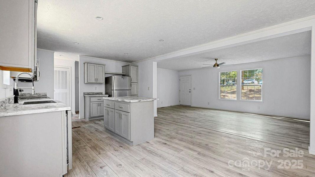 Furnished interior view inside a new home in , Statesville (Image 6).