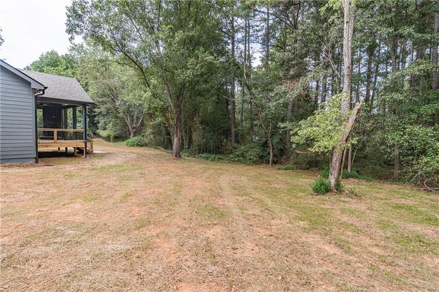 Front exterior of a new home in , Braselton, GA, highlighting curb appeal (Image 26).