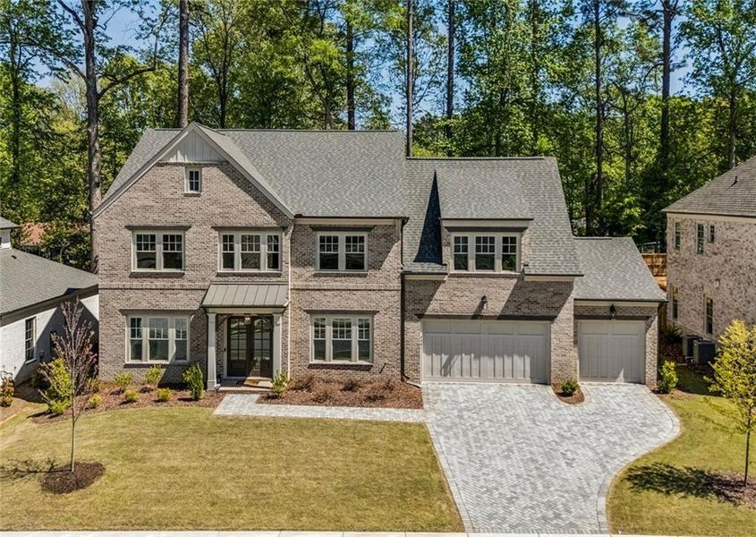 Front exterior of a new home in The Enclave on Lavista, Tucker, GA, highlighting curb appeal (Image 2). Front exterior of a new home in The Enclave on Lavista, Tucker, GA, highlighting curb appeal (Image 2).