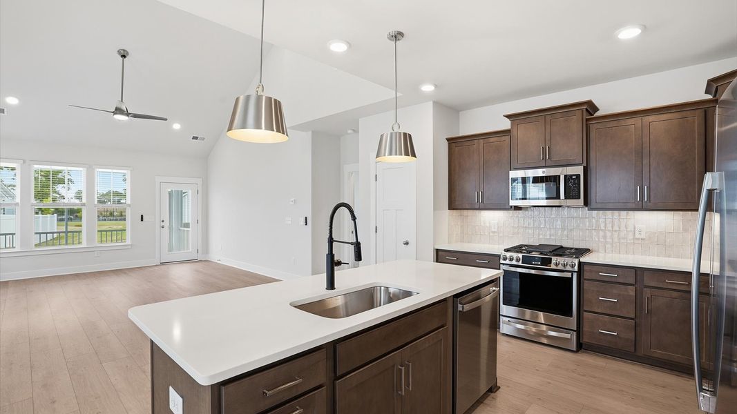 Furnished interior view inside a new home in Village at Midway, Anderson (Image 13).