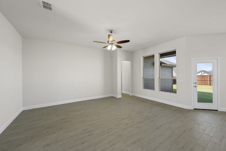 Front exterior of a new home in Still Water Lake, Godley, TX, highlighting curb appeal (Image 14). Front exterior of a new home in Still Water Lake, Godley, TX, highlighting curb appeal (Image 14).