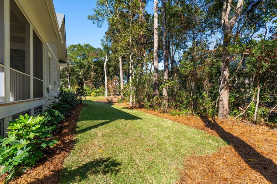 Exterior details and patio area of a home in , Johns Island (Image 45).