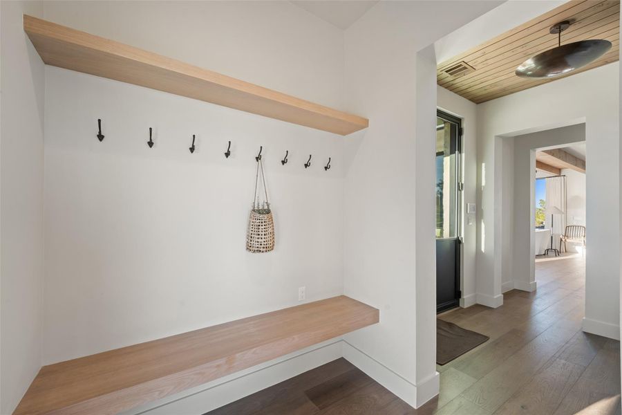 Mudroom featuring wooden ceiling and hardwood / wood-style floors