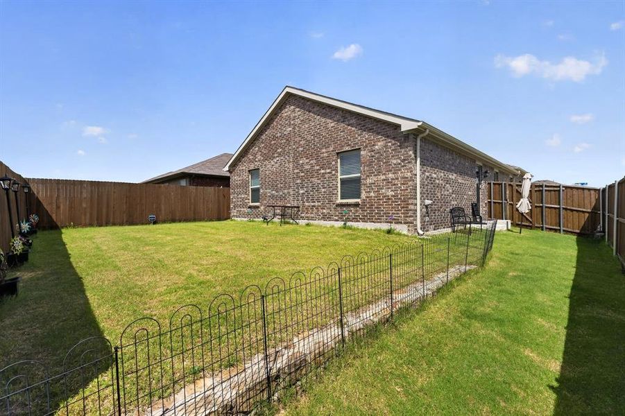 Exterior details and patio area of a home in , Crandall (Image 25). Exterior details and patio area of a home in , Crandall (Image 25).