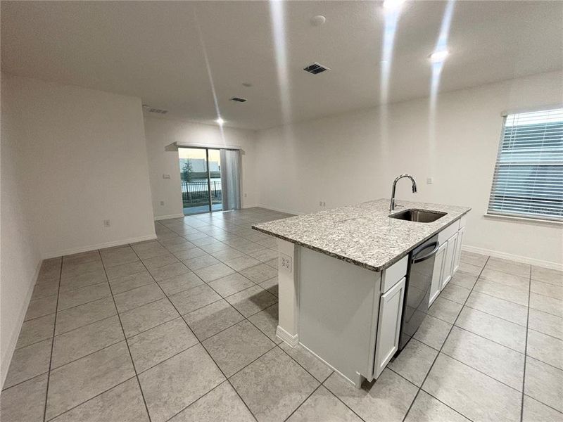 Furnished interior view inside a new home in Lake Deer Estates, Poinciana (Image 5).