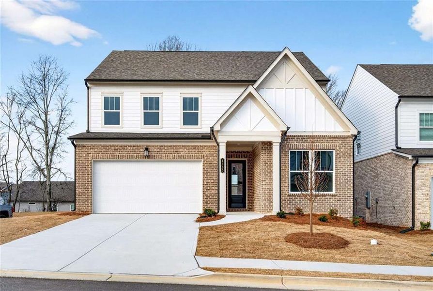 Front exterior of a new home in , Lawrenceville, GA, highlighting curb appeal (Image 1). Front exterior of a new home in , Lawrenceville, GA, highlighting curb appeal (Image 1).