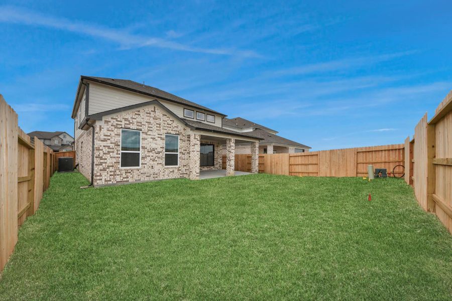 Explore the expansive backyard with its inviting covered patio—a perfect blend of space for the kids to play and adults to unwind. Ideal for creating your outdoor oasis, this backyard accommodates patio furniture, a BBQ pit, and endless possibilities for leisure and entertainment.