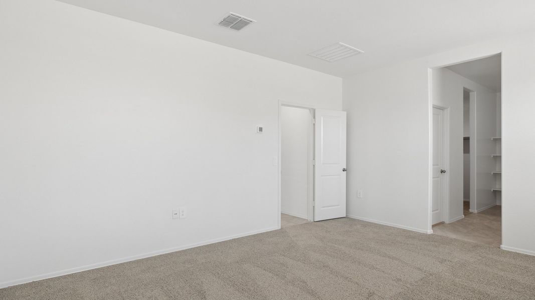 Representative unfurnished interior of a home built from the Lakeway by D.R. Horton in Heartland Ranch, Coolidge (Image 32).